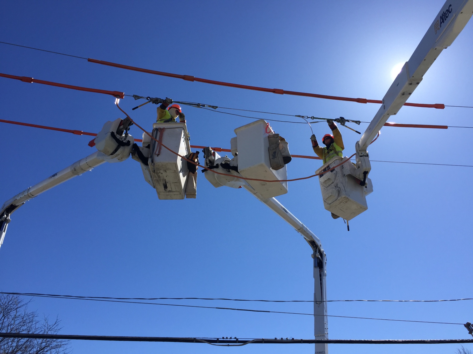 Lineworkers on live line rebuild